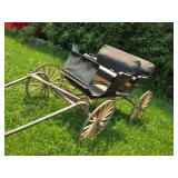 Antique Horse-Drawn Buggy with Wooden Wheels