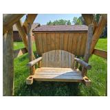 Rustic Wooden Outdoor Swing with Log Construction