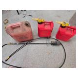 Lot of Red Gas Cans with Spouts and Manual Transfer Pump