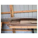 Assorted Building Materials with Plywood and Lumber