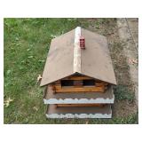 Decorative Wooden Birdhouse with Painted Roof and Chimney