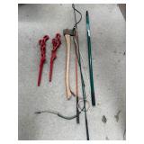 Collection of Farm Tools and Equipment including Chains, Axe, and Stakes