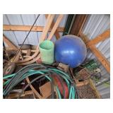 Collection of Garage and Garden Tools with Hose and Exercise Ball