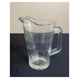 Collection of Assorted Kitchen Storage Containers and Glass Pitcher
