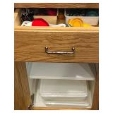 Collection of Kitchen Utensils and Clear Storage Bins