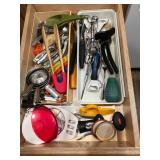 Collection of Kitchen Utensils and Clear Storage Bins