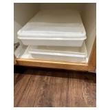 Collection of Kitchen Utensils and Clear Storage Bins