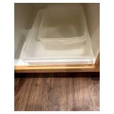 Collection of Kitchen Utensils and Clear Storage Bins