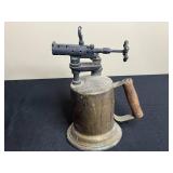 Vintage Collection: Watering Can, Woodlink Squirrel Feeder, Brass Blowtorch, and Ceramic Jar