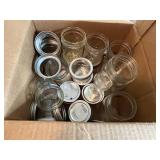 Collection of Vintage Coolers and Canning Jars with Accessories