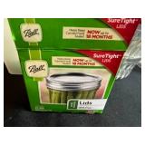 Collection of Vintage Coolers and Canning Jars with Accessories