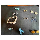 Assorted Vintage Jewelry Collection with Earrings, Pins, and Brooches