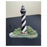 Eclectic Collection of Novelty Items and Souvenirs Inc Lighthouse Figurine, Bells & Miniature Tractor