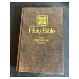 Religious Collection: Bibles, Angel Figurine, Cross, and Framed Embroidery