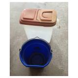 Assorted Household and Garage Items Including Measuring Wheel, Containers, and Buckets