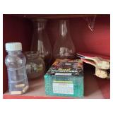 Assorted Household Items Including Ping Pong Paddles, Glass Vases, and More