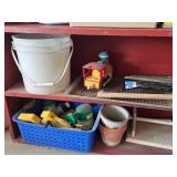 Assorted Garden and Household Tools with Toy Train