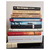 Collection of Books Including Titles by Yuval Noah Harari and Jon Meacham