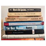 Collection of Books Including Titles by Yuval Noah Harari and Jon Meacham