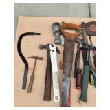 Assorted Collection of Hand Tools Including Hammers, Saws, and Screwdrivers