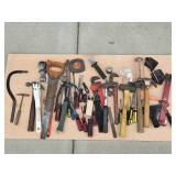 Assorted Collection of Hand Tools Including Hammers, Saws, and Screwdrivers