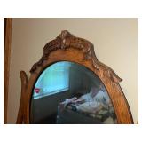Antique Oak Dresser with Ornate Mirror and Three Drawers