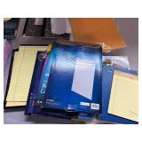Assortment of Office Supplies including Address Labels, Paper, and Envelopes