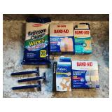 Assortment of Band-Aids, Fabric Bandages, Bathroom Cleaner Wipes & Razors - content quantities unverified