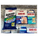 Assortment of Band-Aids, Fabric Bandages, Bathroom Cleaner Wipes & Razors - content quantities unverified