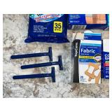 Assortment of Band-Aids, Fabric Bandages, Bathroom Cleaner Wipes & Razors - content quantities unverified
