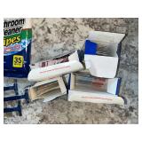 Assortment of Band-Aids, Fabric Bandages, Bathroom Cleaner Wipes & Razors - content quantities unverified