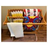 Wooden Quilt Rack with Assorted Patterned Quilts & A Knit Throw