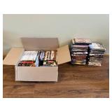 Large Collection of DVDs Including Downton Abbey, Big Bang Theory, and More