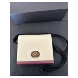 Handcrafted Crossbody Bag with Recycled Materials and Adjustable Strap