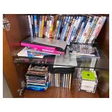 Large Collection of DVDs, CDs, and VHS Tapes