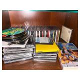 Large Collection of DVDs, CDs, and VHS Tapes