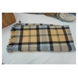 Home Decor: Wicker basket, embroidered pillows, blanket