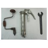 Vintage Brace Hand Drill, Vintage Open-Ended Wrench, and Grease Gun