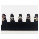 Group of 12 Gold Tone Base Metal Rings. Size 7-7.5.