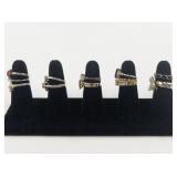 Group of 12 Gold Tone Base Metal Rings. Size 7-7.5.
