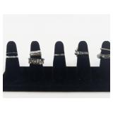 Group of 10 Silver Tone Base Metal Rings. Size 7-7.75.
