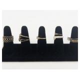 Group of 8 Gold Tone Base Metal Rings. Size 8.75-9.75.