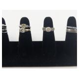 Group of 10 Silver Tone Base Metal Rings. Size 6.75-7.