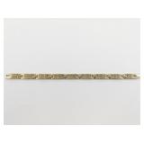 Monet Ribbed Gold Tone Base Metal Link Bracelet.