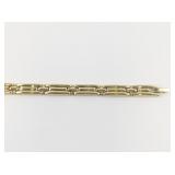 Monet Ribbed Gold Tone Base Metal Link Bracelet.