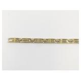 Monet Ribbed Gold Tone Base Metal Link Bracelet.