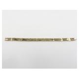 Monet Ribbed Gold Tone Base Metal Link Bracelet.