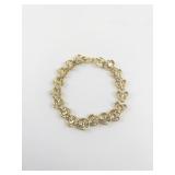 Multi-Colored Rhinestone Accented Gold Tone Base Metal Heart Link Bracelet.