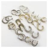 Group of 12 Base Metal Hoop Earrings .