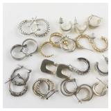 Group of 12 Base Metal Hoop Earrings .